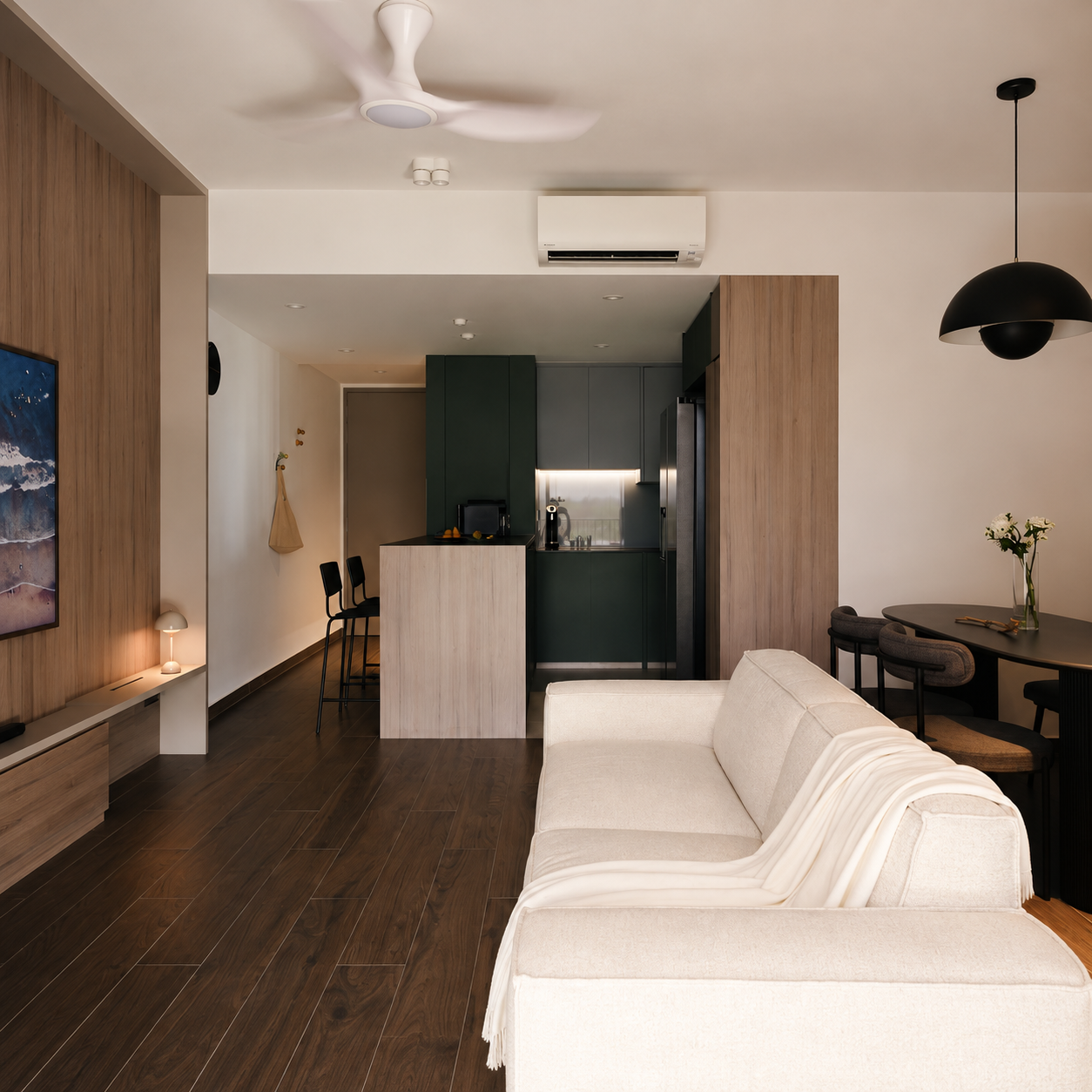 Furnished living room with a white sofa and dining area
