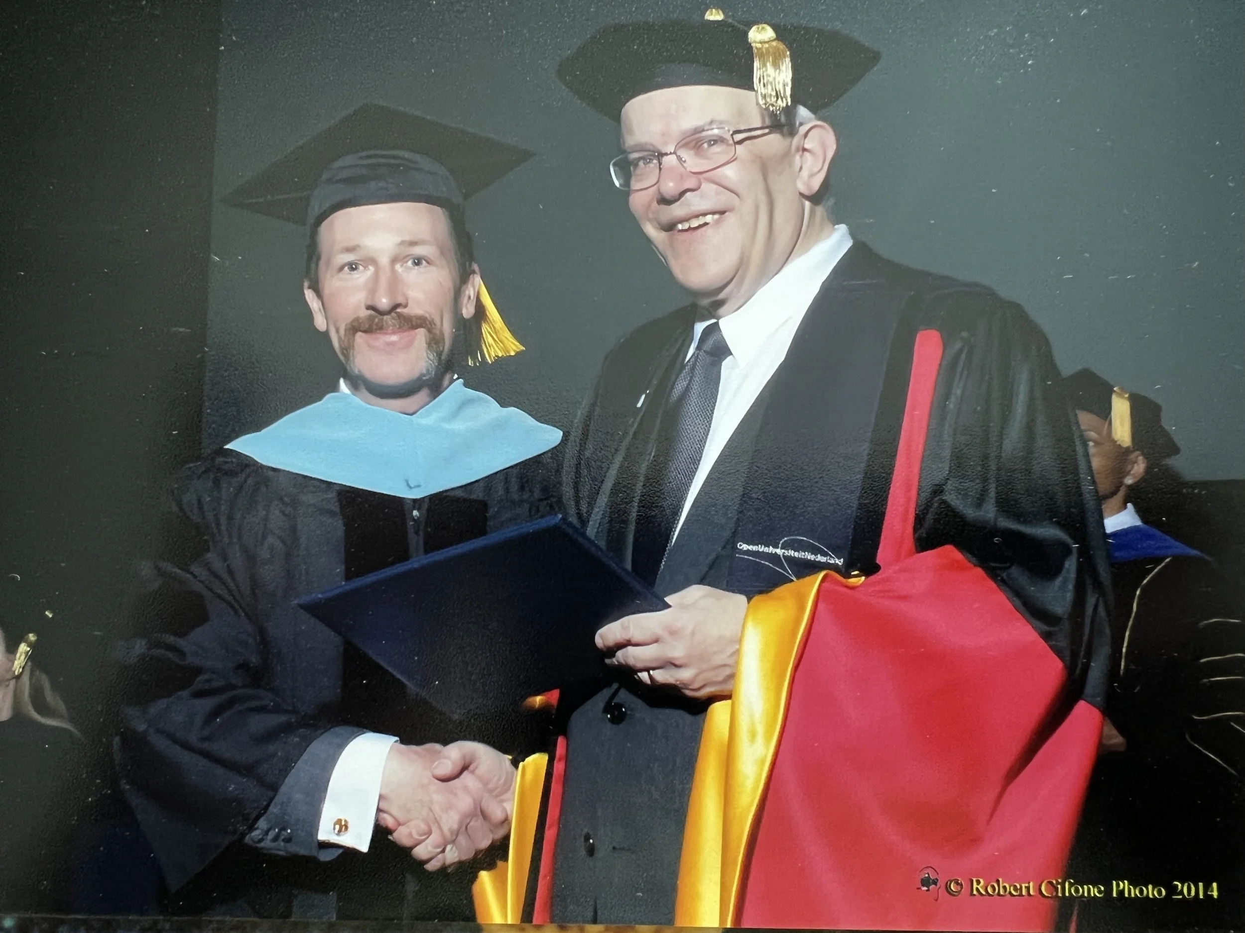 Wargo at his Ph.D. graduation with Alan Lesgold, professor emeritus at University of Pittsburgh.
