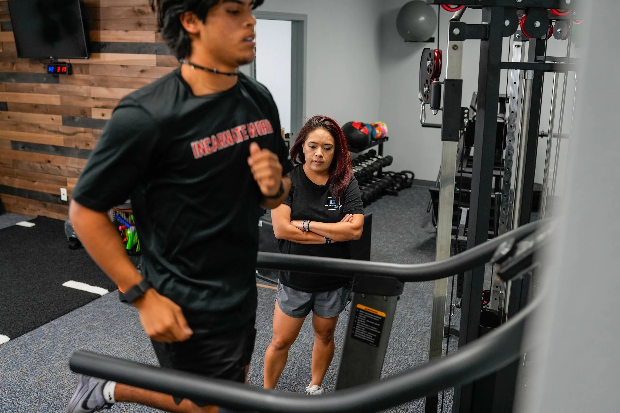 Athlete running on treadmill being evaluated
