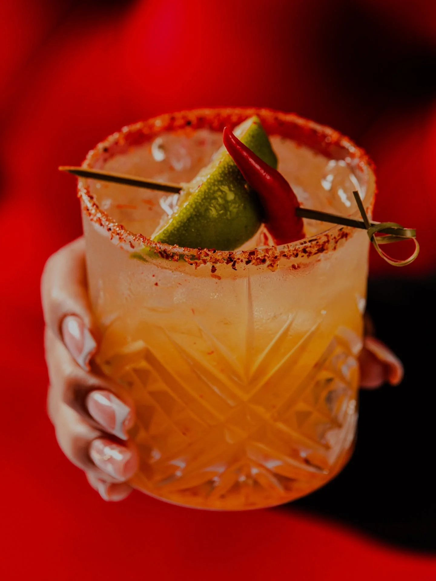 Bartender pouring a signature cocktail at Panda Harlem in Harlem