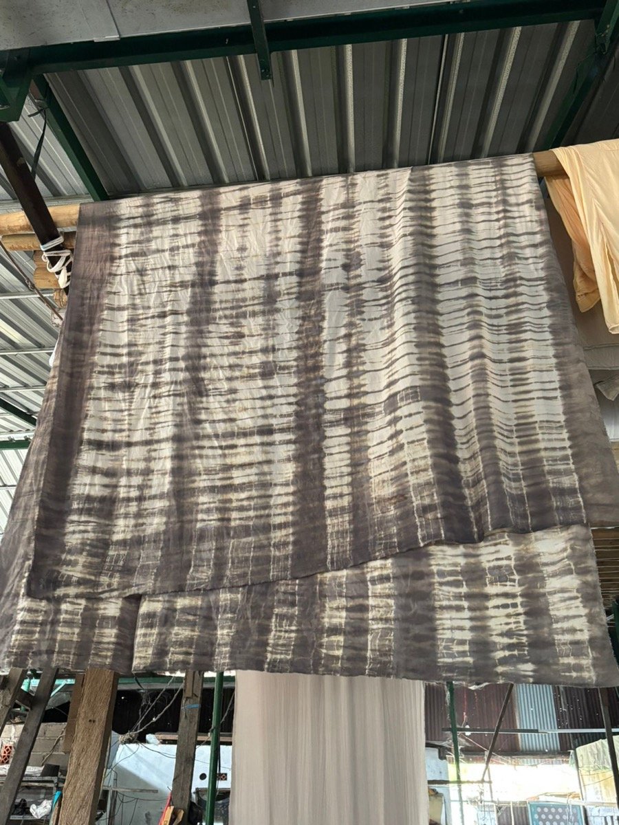 Naturally dyed fabric drying in the Bali workshop, Nousa Concept