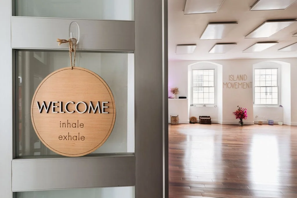 Welcome sign at the Island Movement yoga studio