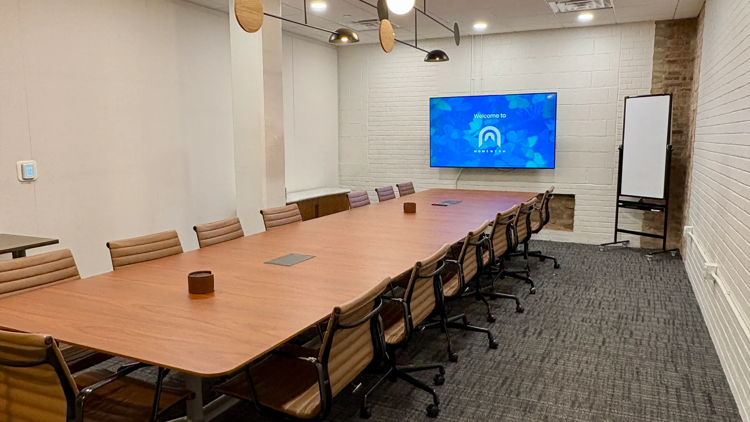 South Bend Watch Conference Room (Room 112), boardroom seating for fourteen