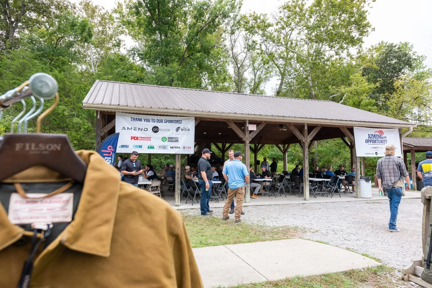 The pavilion at Sycamore Sporting Clays with the thank-you banner for 2026 sponsors