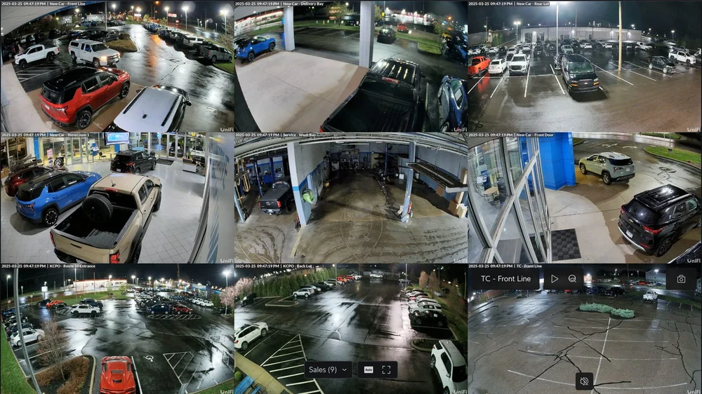 UniFi Protect camera views covering a parking lot and service areas at night