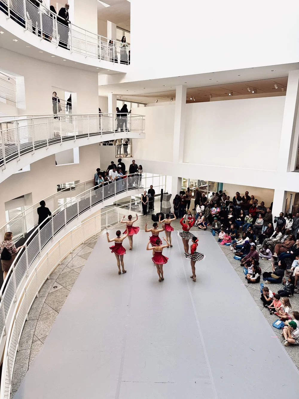 Rise City Dance performing in the atrium of the High Museum of Art