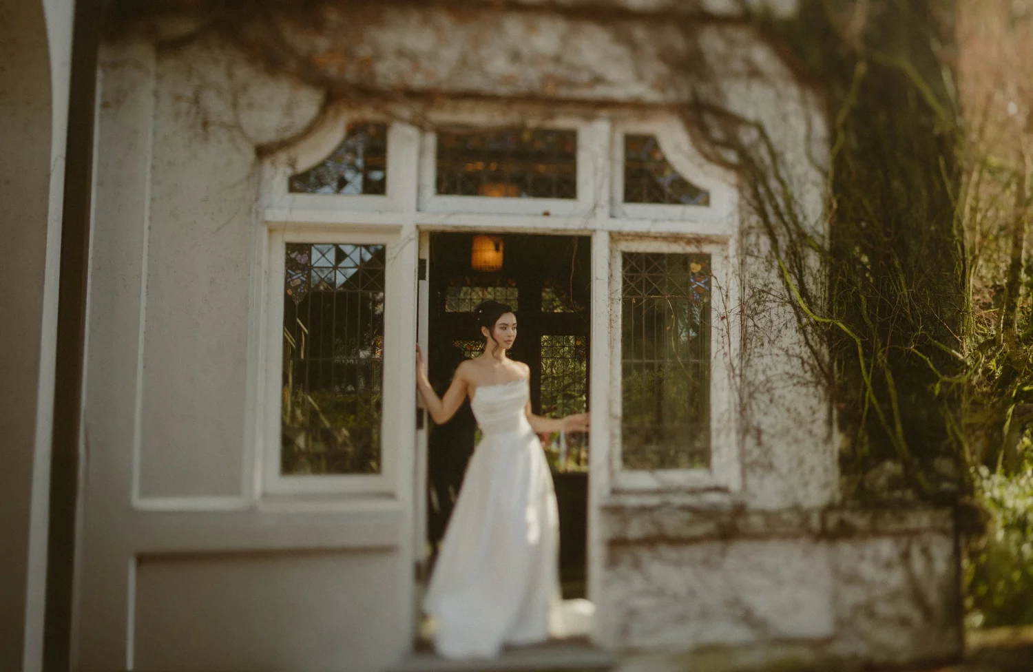 Bride in a stained-glass doorway