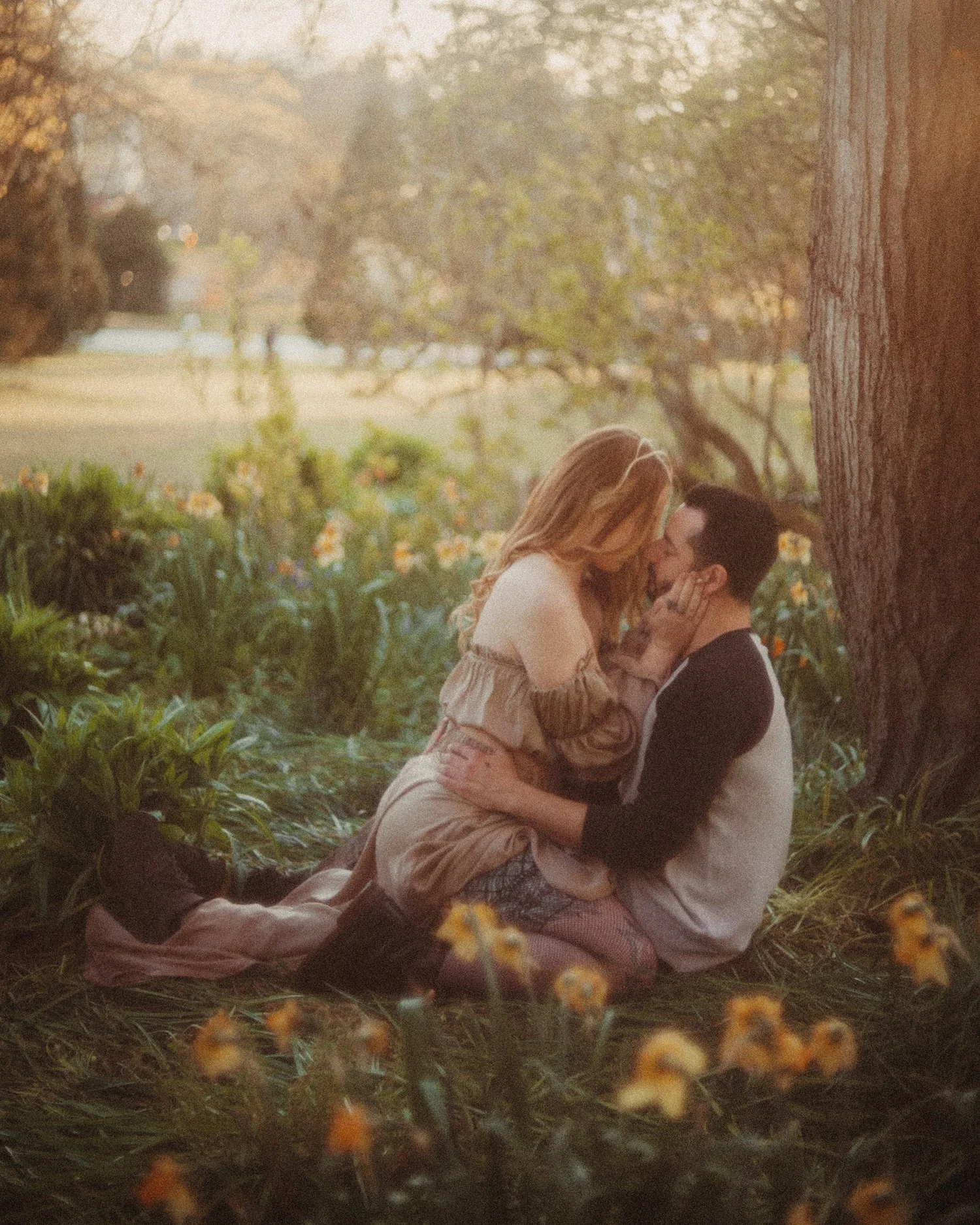 Couple kissing during their engagement session
