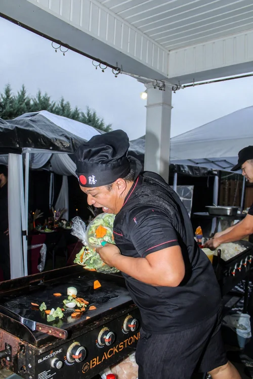 Hibachi chef preparing dinner at the grill