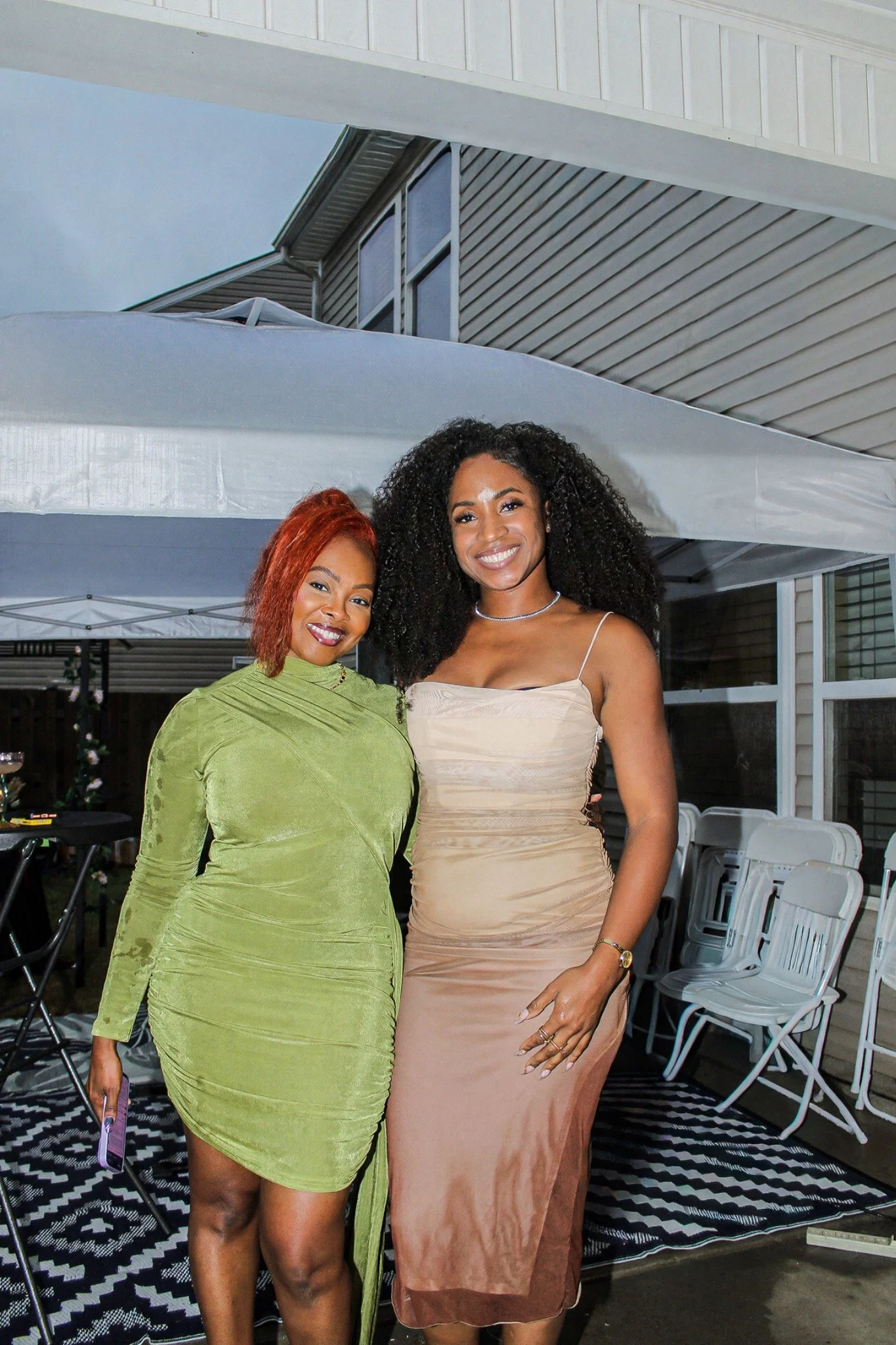 Birthday portrait with a friend beneath the patio canopy