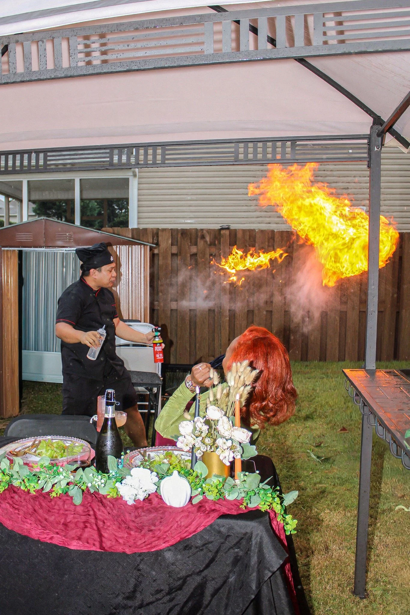 Hibachi flame display beside the birthday dining table