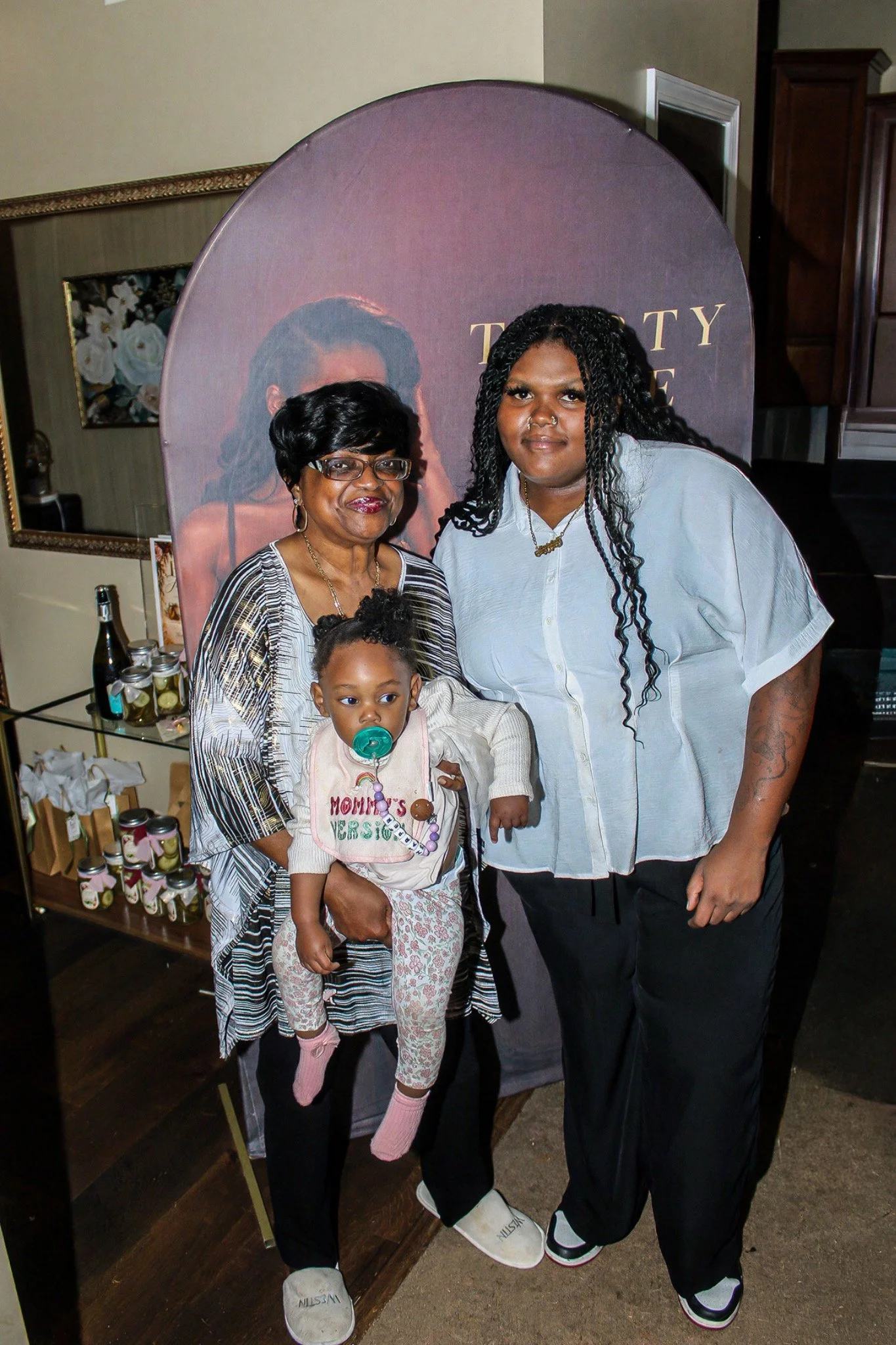 Family portrait with a baby at the birthday party