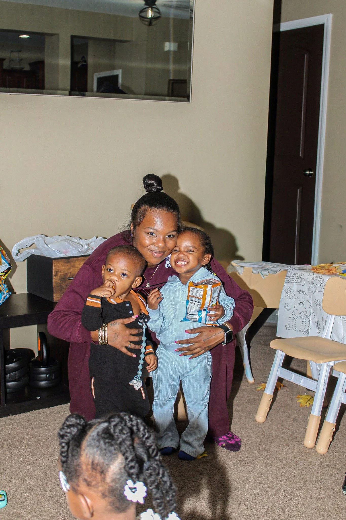 A warm family moment with children at the celebration