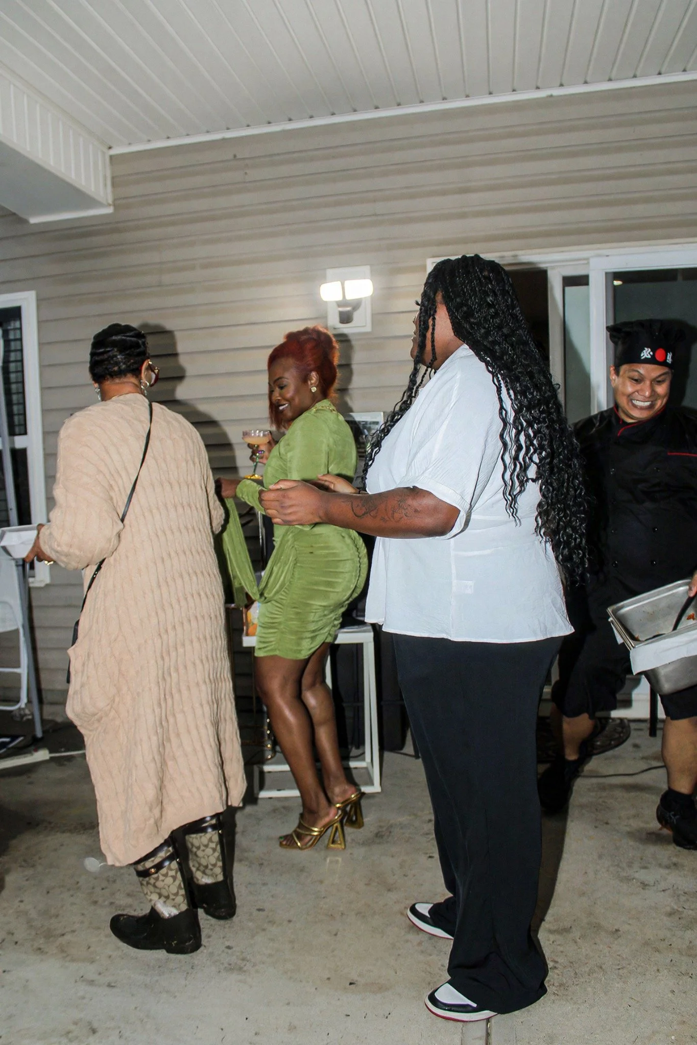 Dancing and celebrating together on the patio