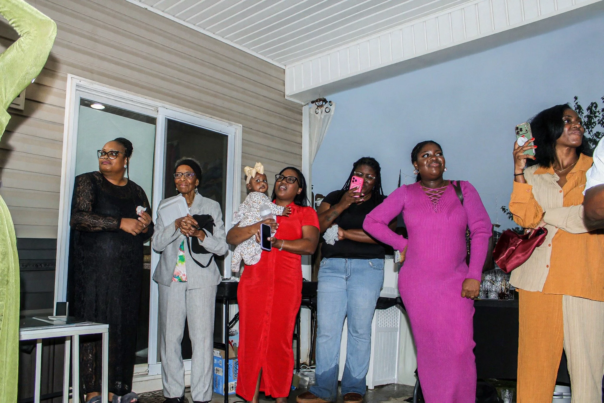 Guests gathered on the patio during the celebration