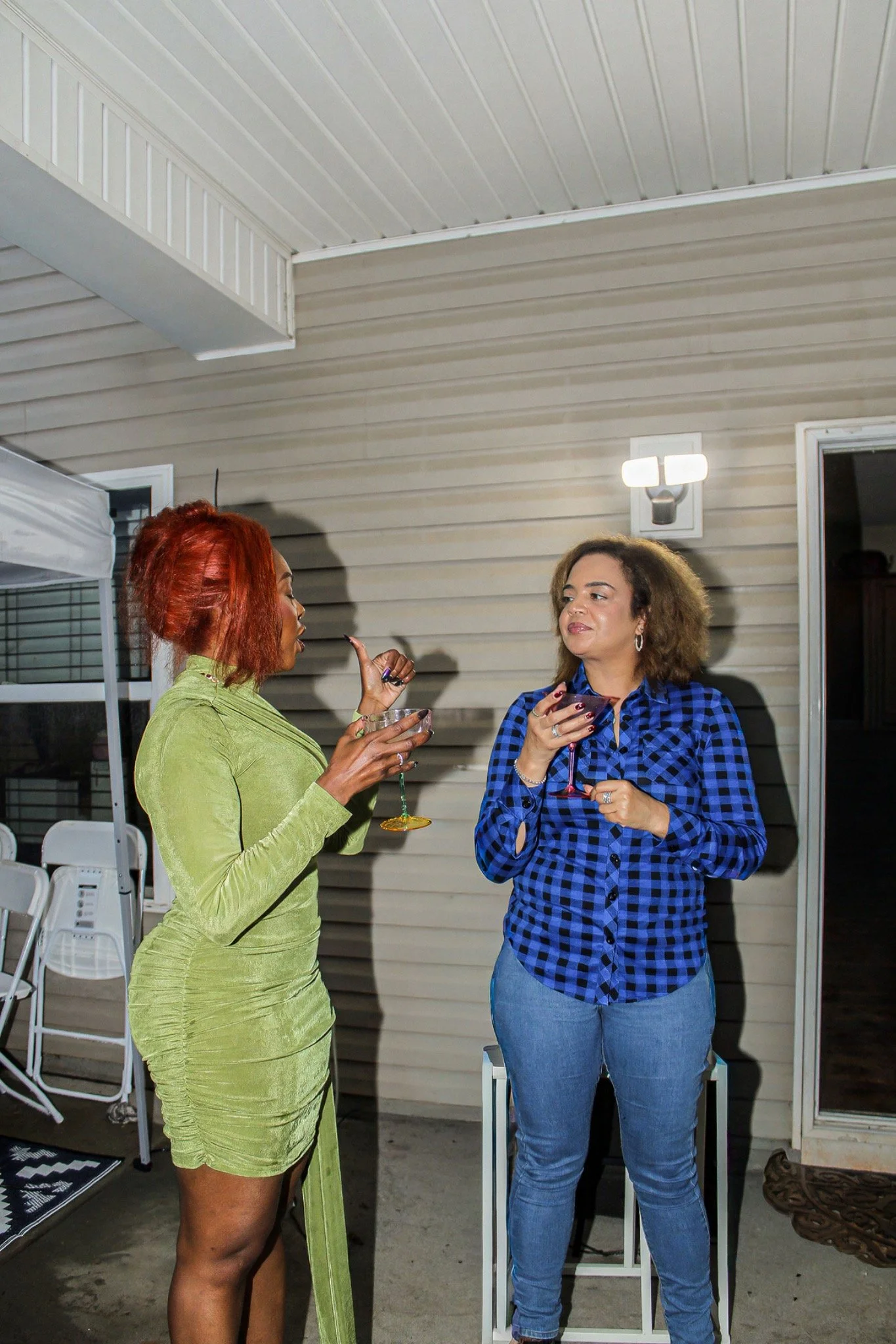 A birthday conversation with a guest on the patio