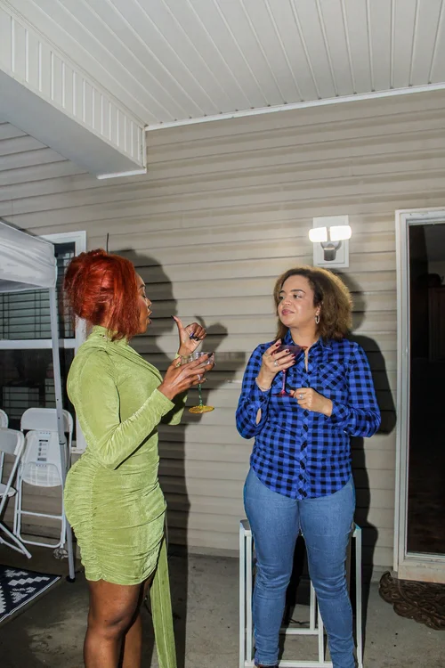 A birthday conversation with a guest on the patio