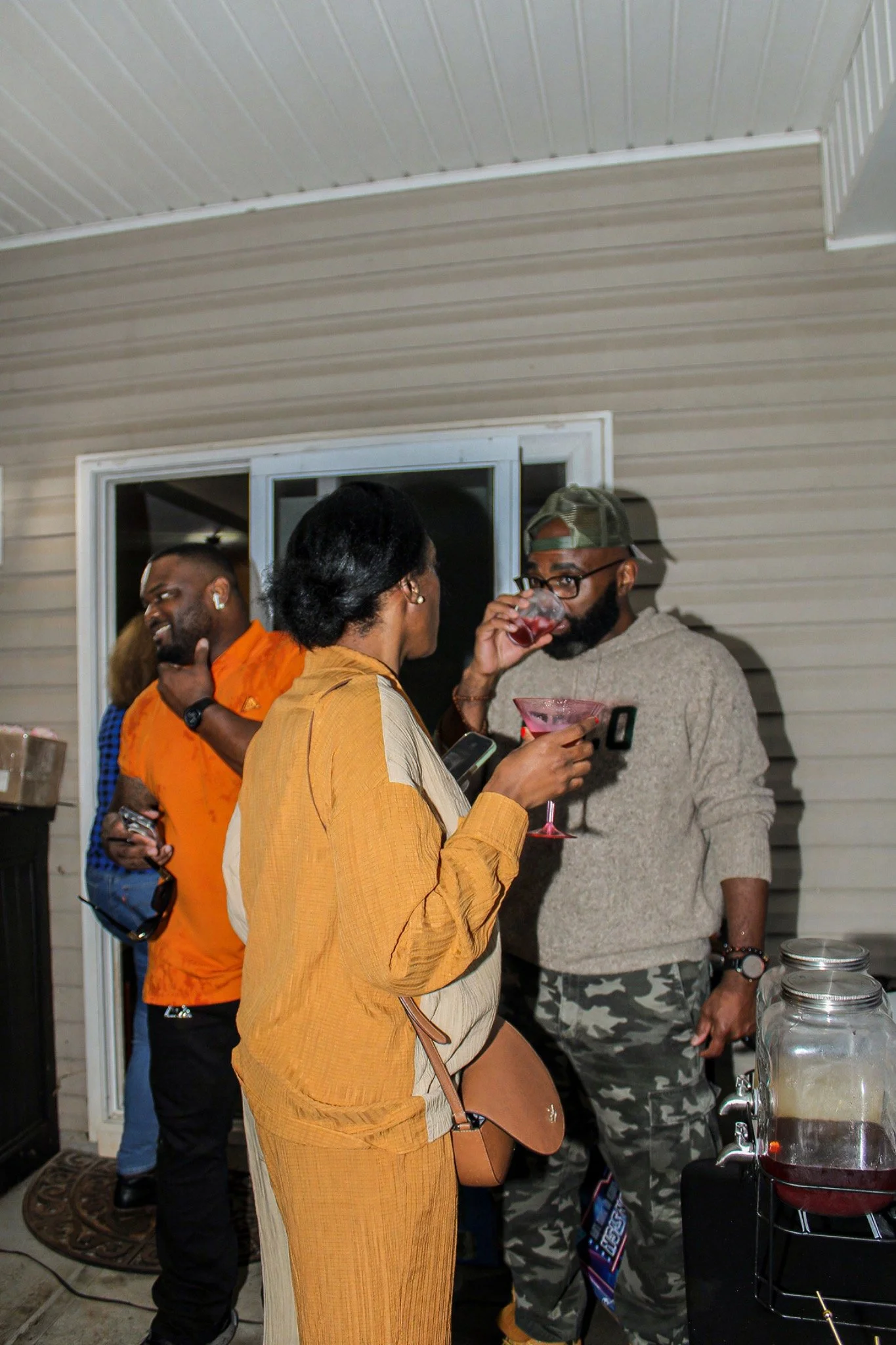 Guests enjoying the birthday celebration together