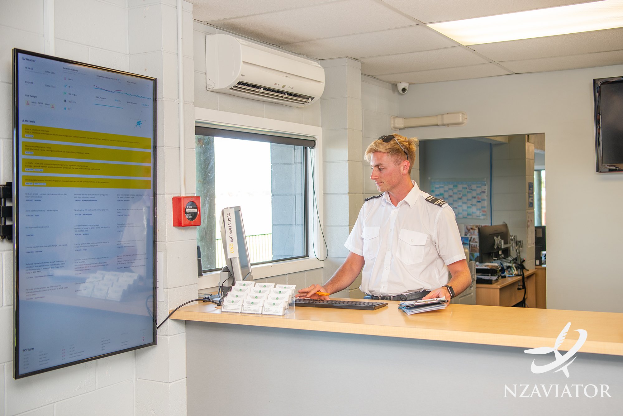 Instructor checking flight schedules…