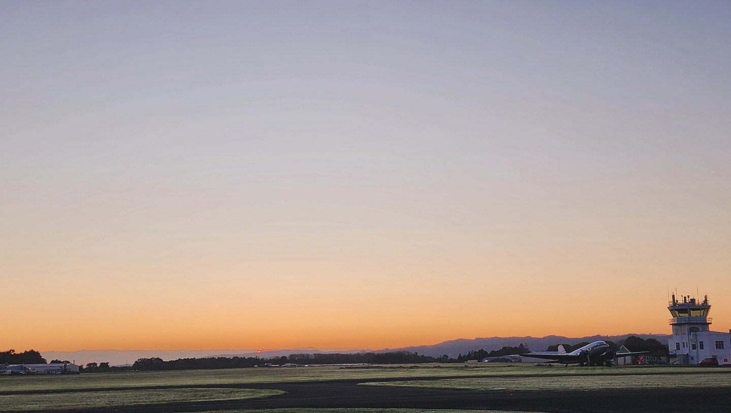 Sunset over airport runway