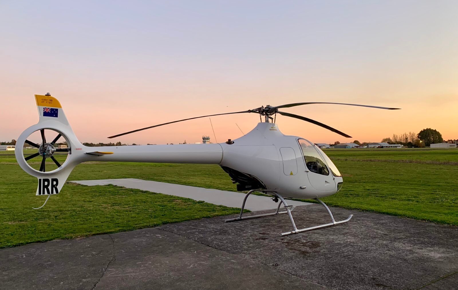 Cabri G2 helicopter, registered ZK-IRR, parked on the tarmac at Auckland Ardmore Airport
