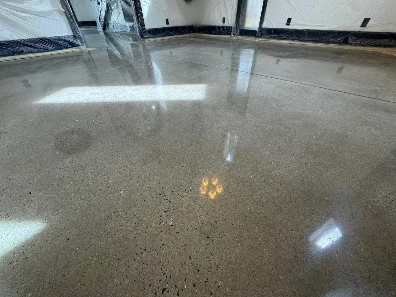 Polished concrete residential floor by RockGrinderz
