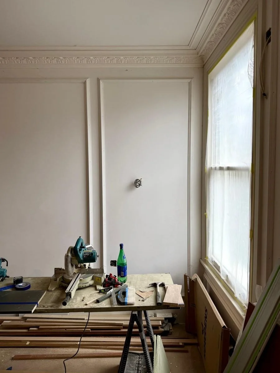 Mayford Road — panelled reception beneath a restored Victorian cornice