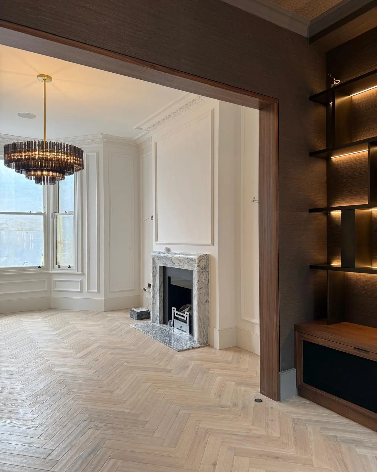 Hammersmith House — reception with marble fireplace and walnut joinery