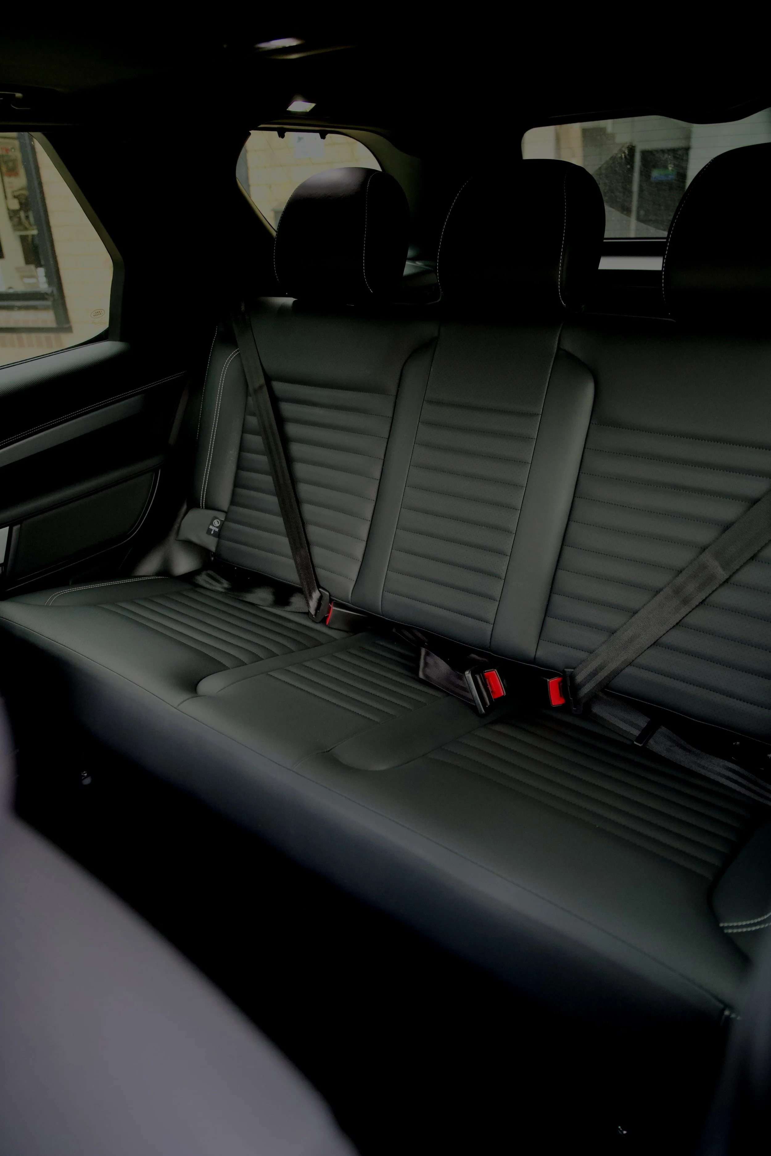 Land Rover Defender with ScotSeat commercial rear seat conversion fitted at Utopia Tints Durham