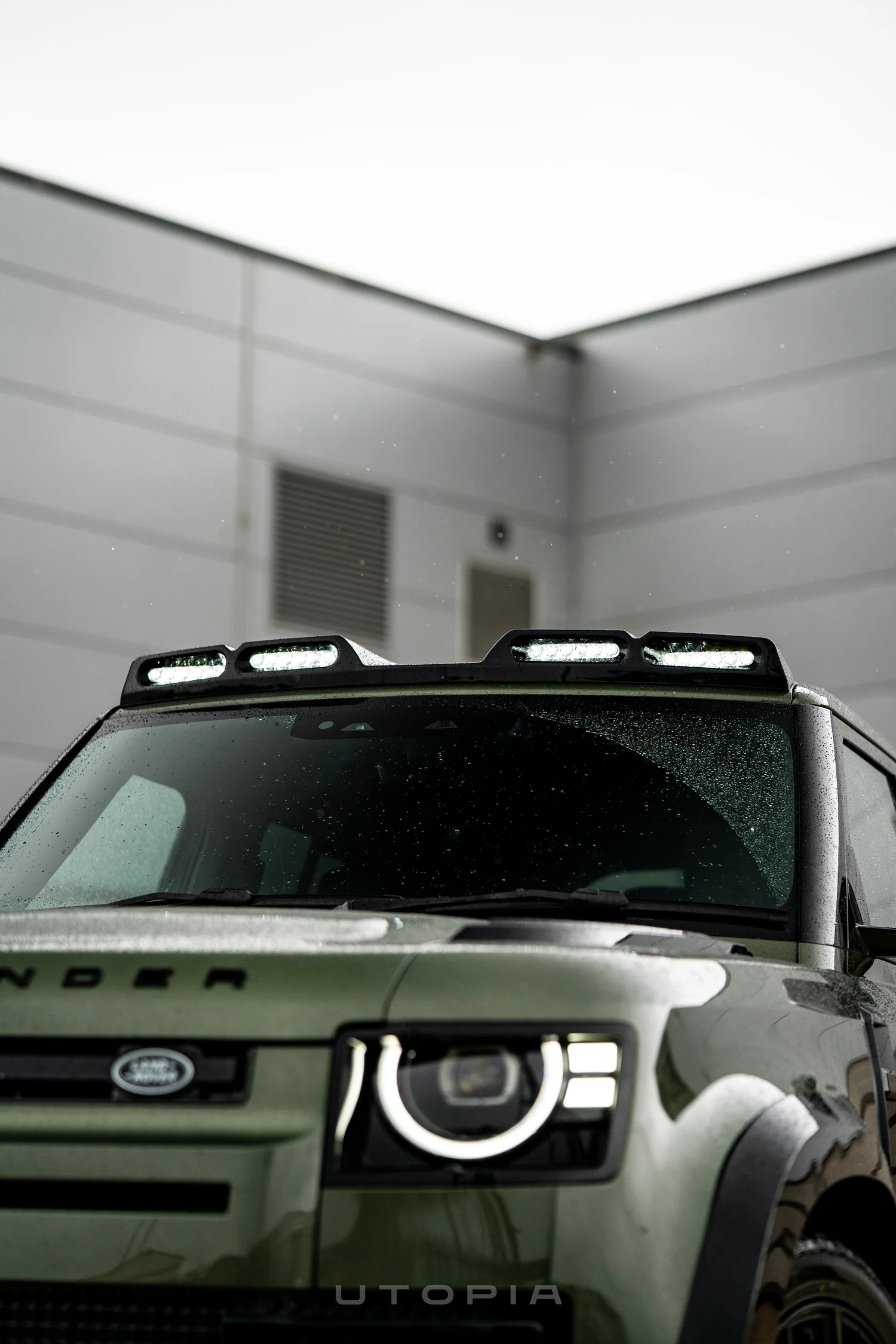High powered roof light bar lit up on a Land Rover Defender at Utopia