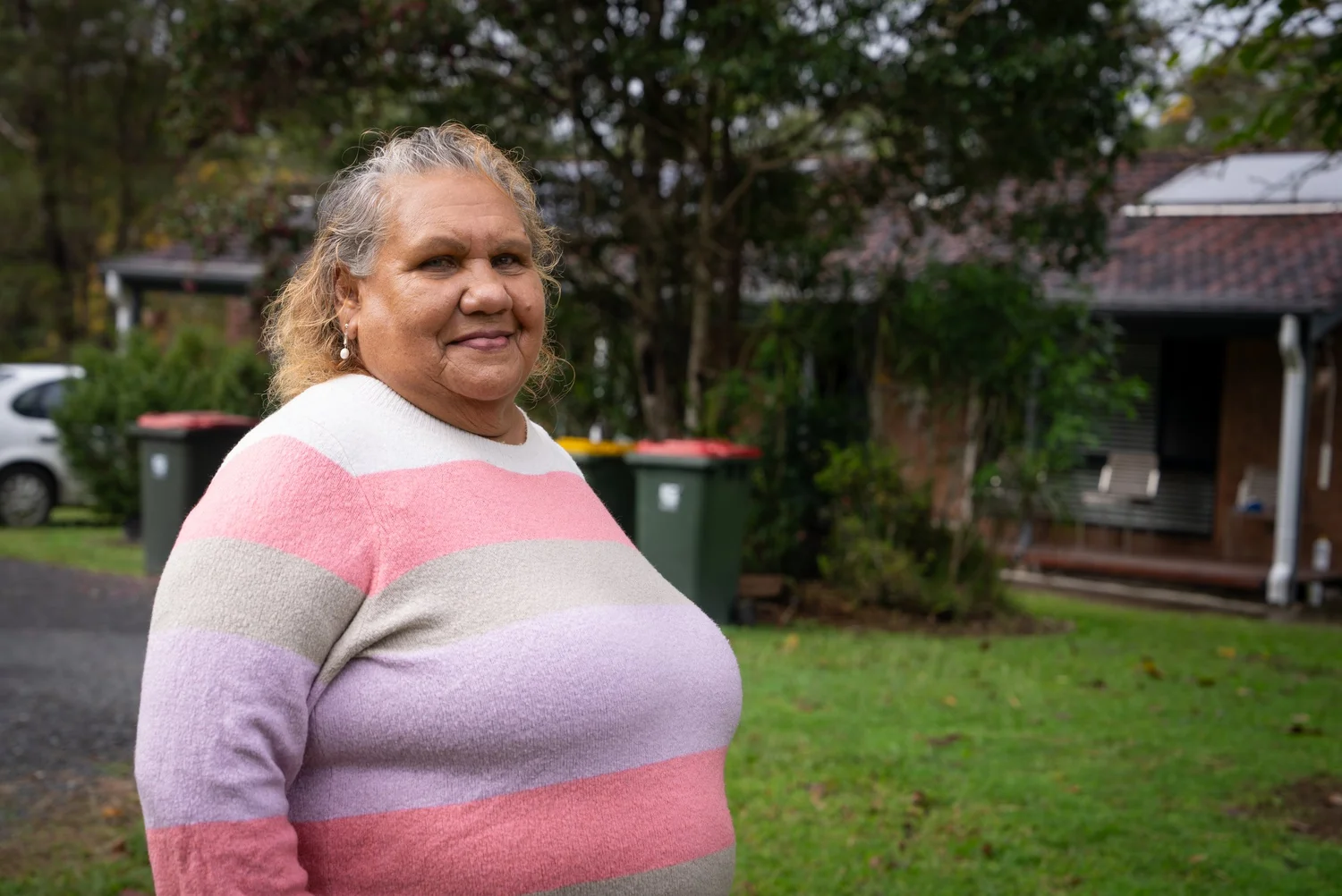 Birribee Housing community members photographed on site