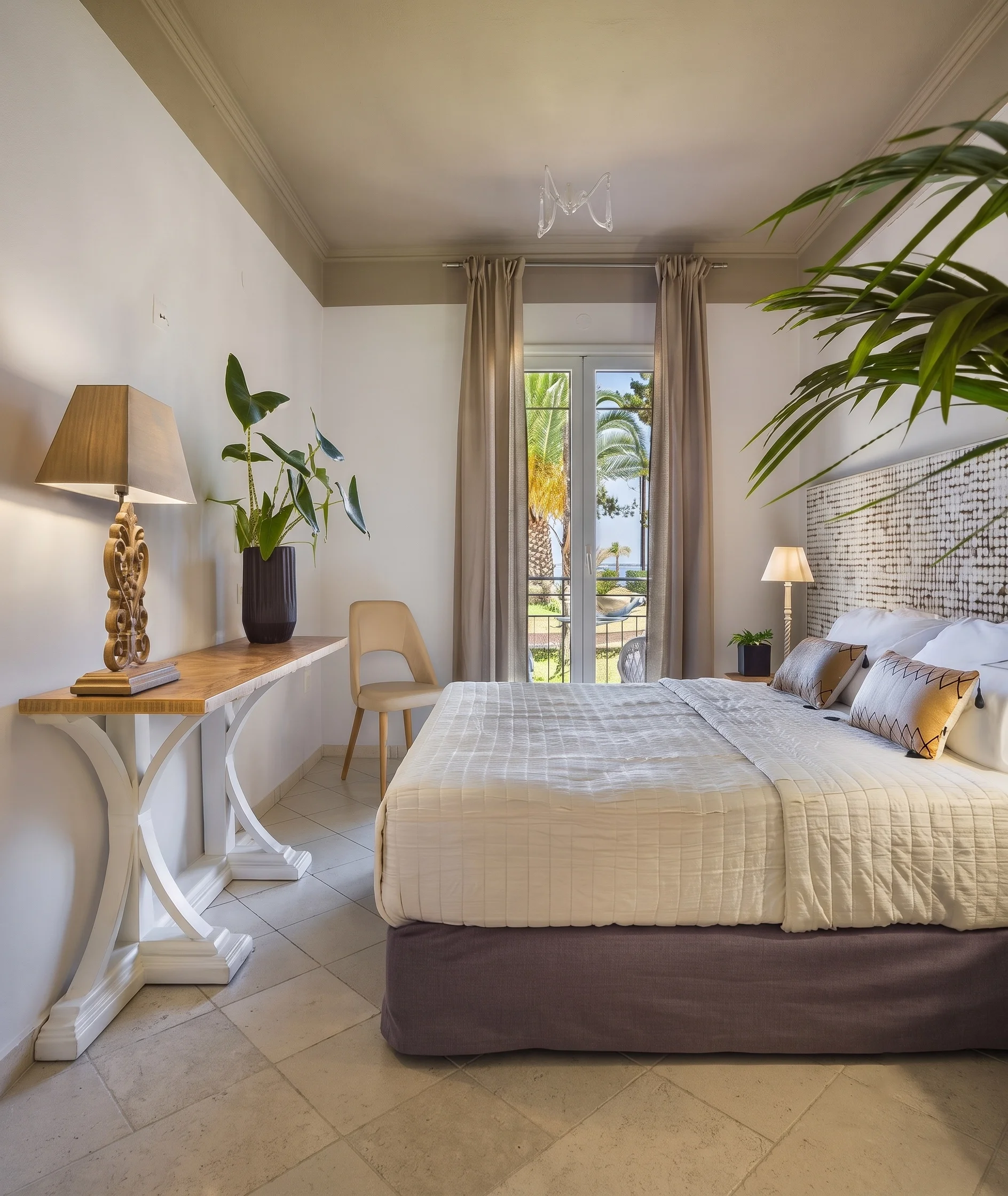 Hotel bedroom, white patina coco mosaic headboard