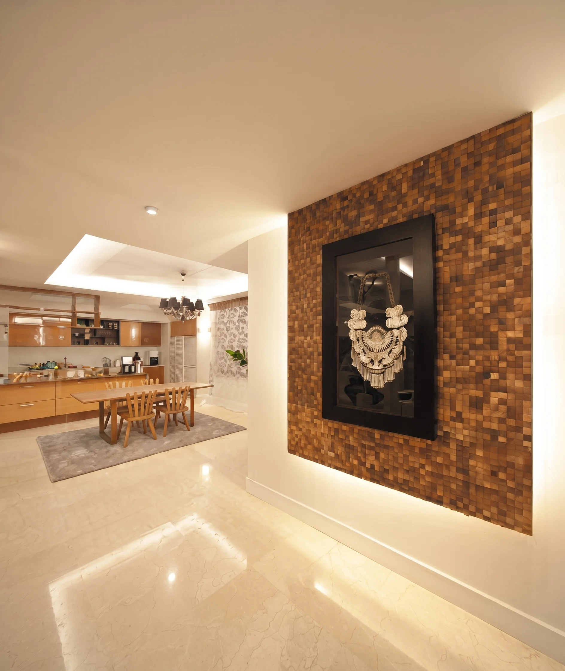 Living space, brick accent wall, open kitchen