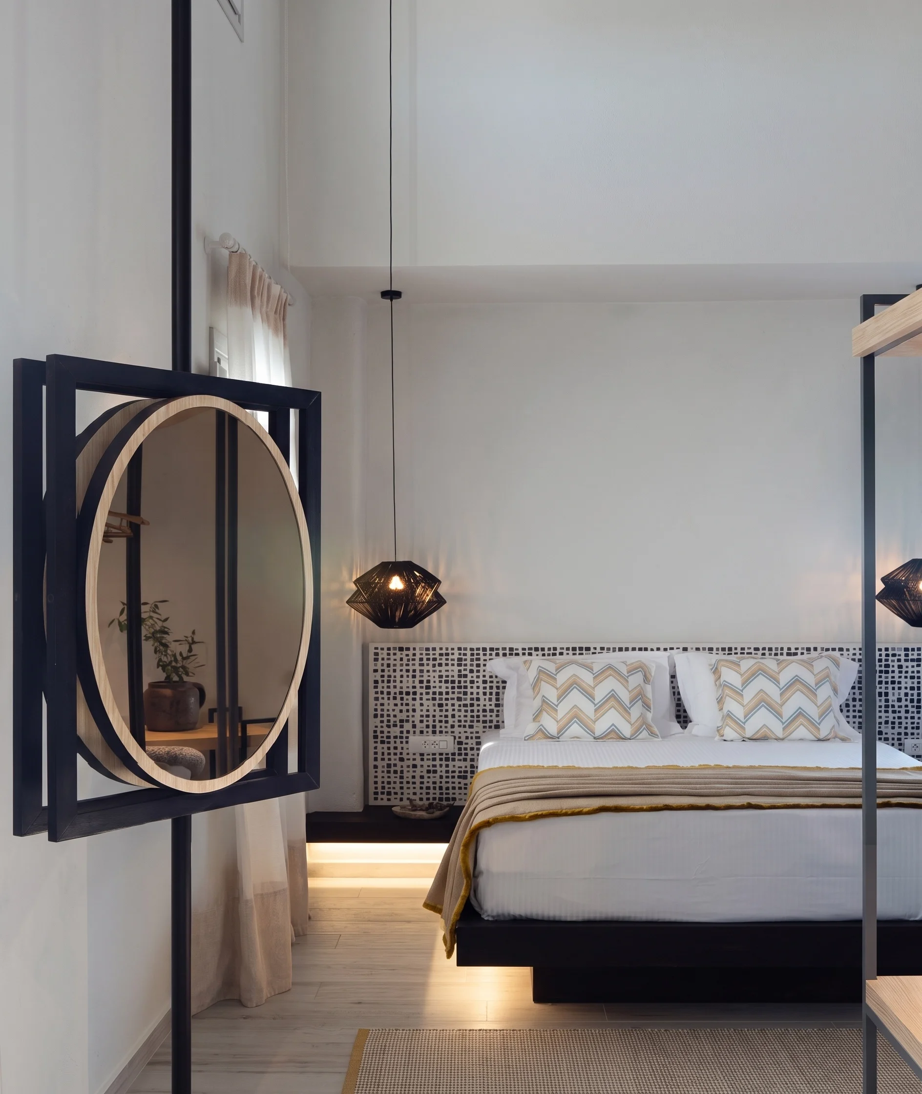 Hotel bedroom, tumbled mocha mosaic headboard