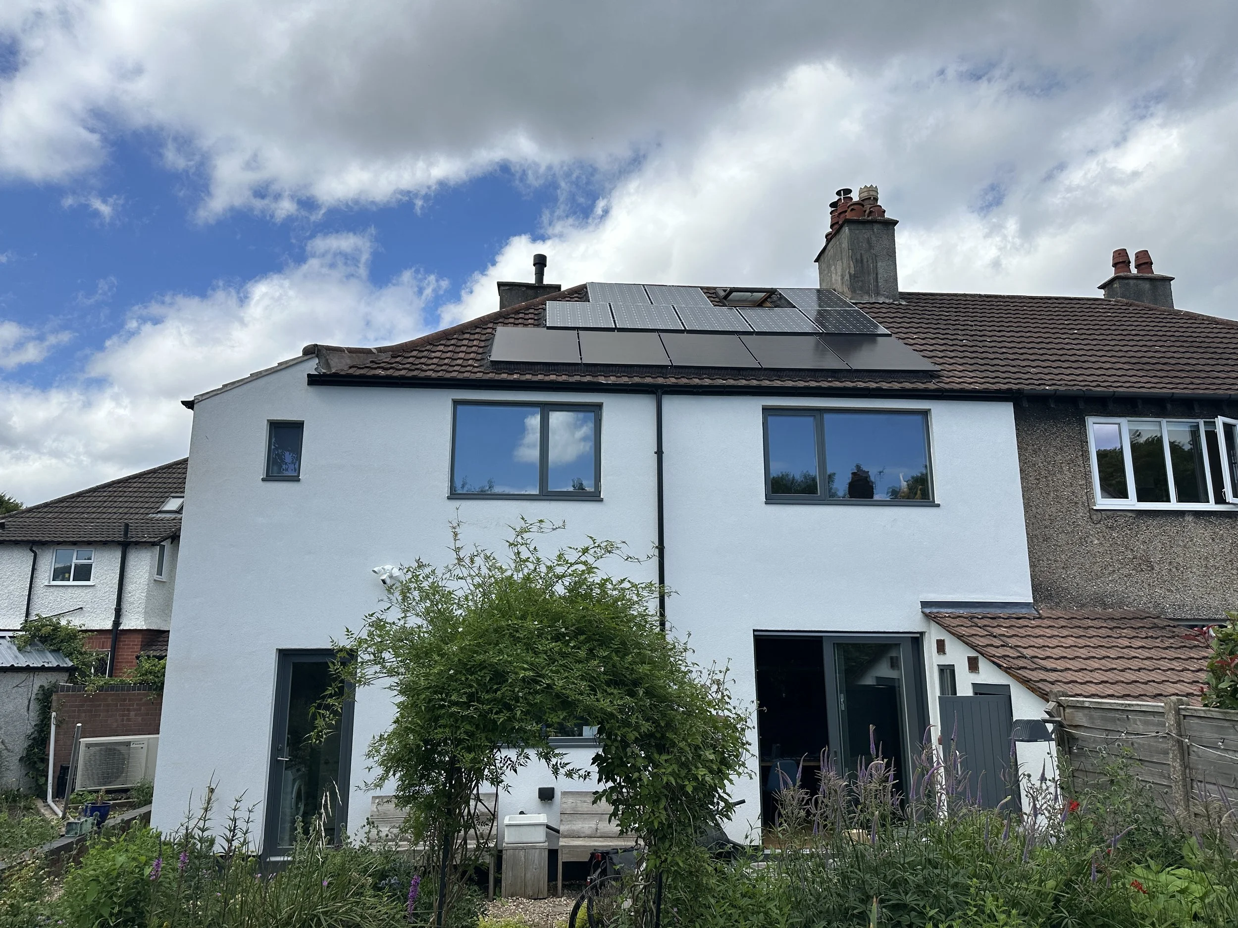 Home with solar panels and energy upgrades