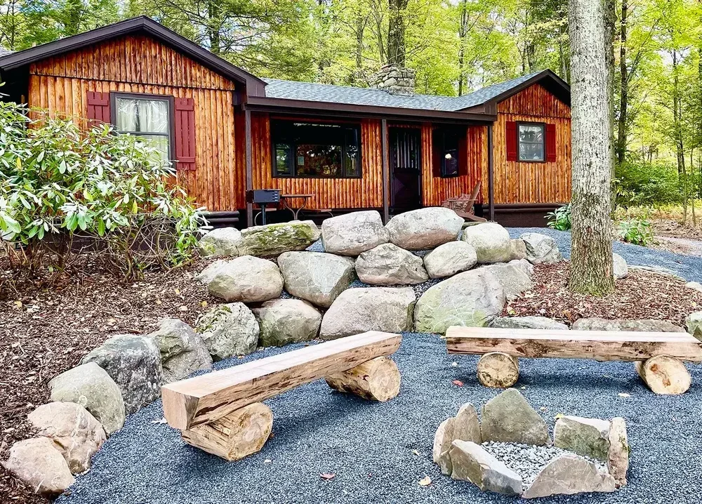Lakeview Cabin 25 lakefront exterior and outdoor fire pit at Mountain Springs Lake Resort