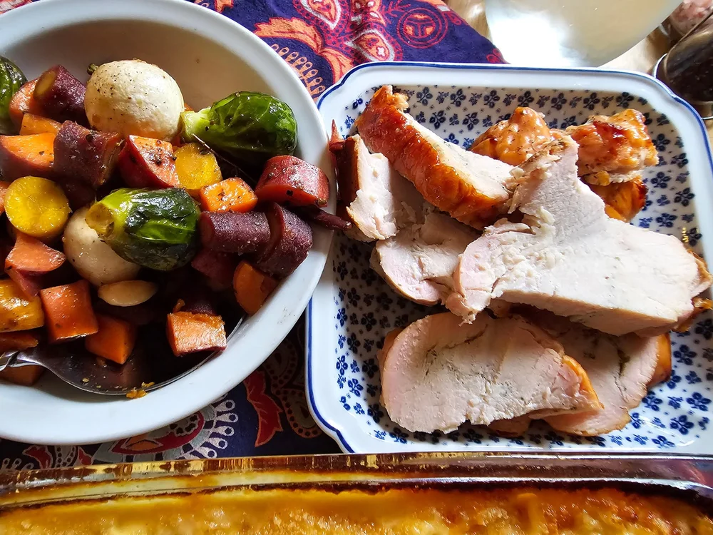 Roasted vegetables and sliced turkey