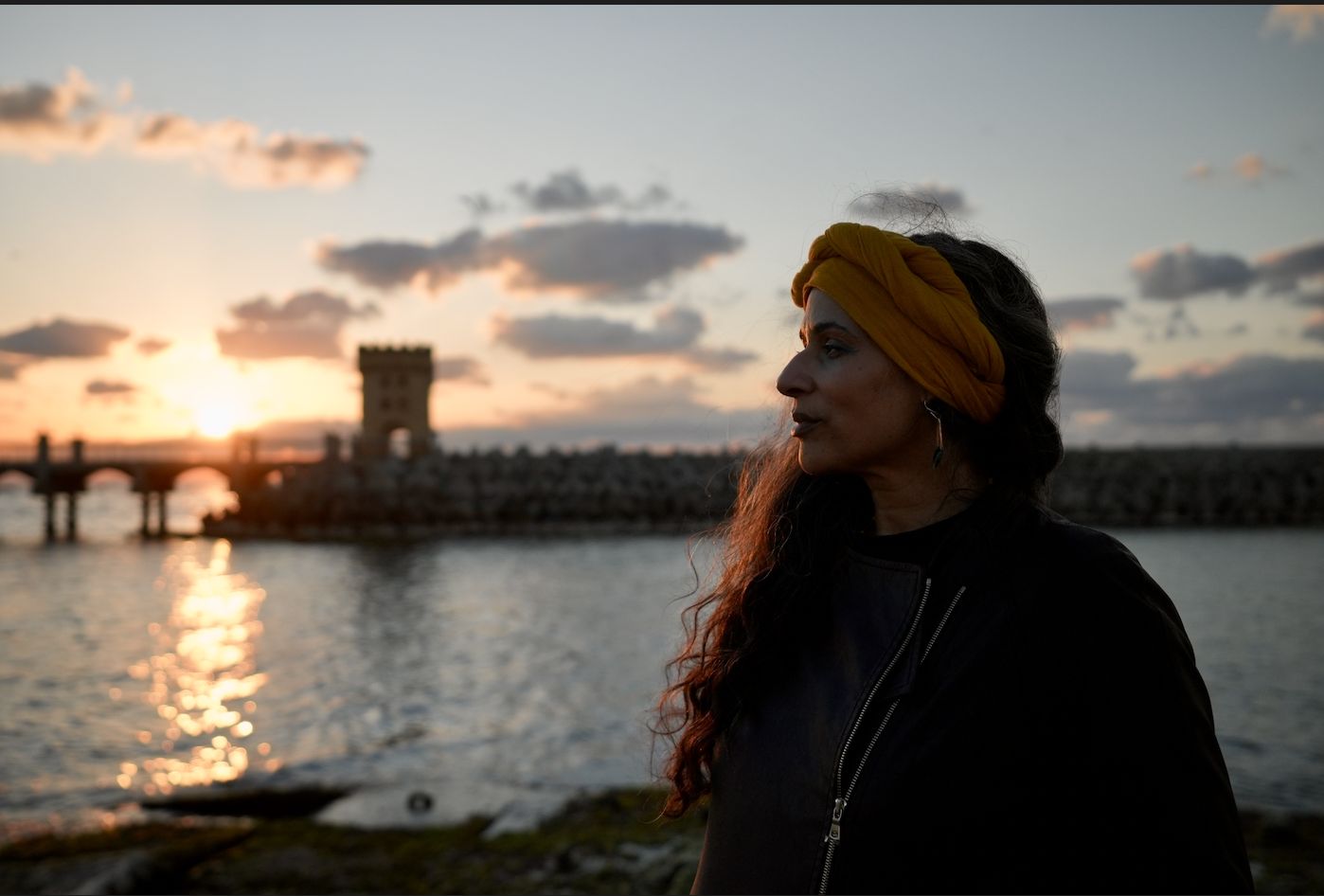 Priestess Rachel Deneé beside the Mediterranean Sea