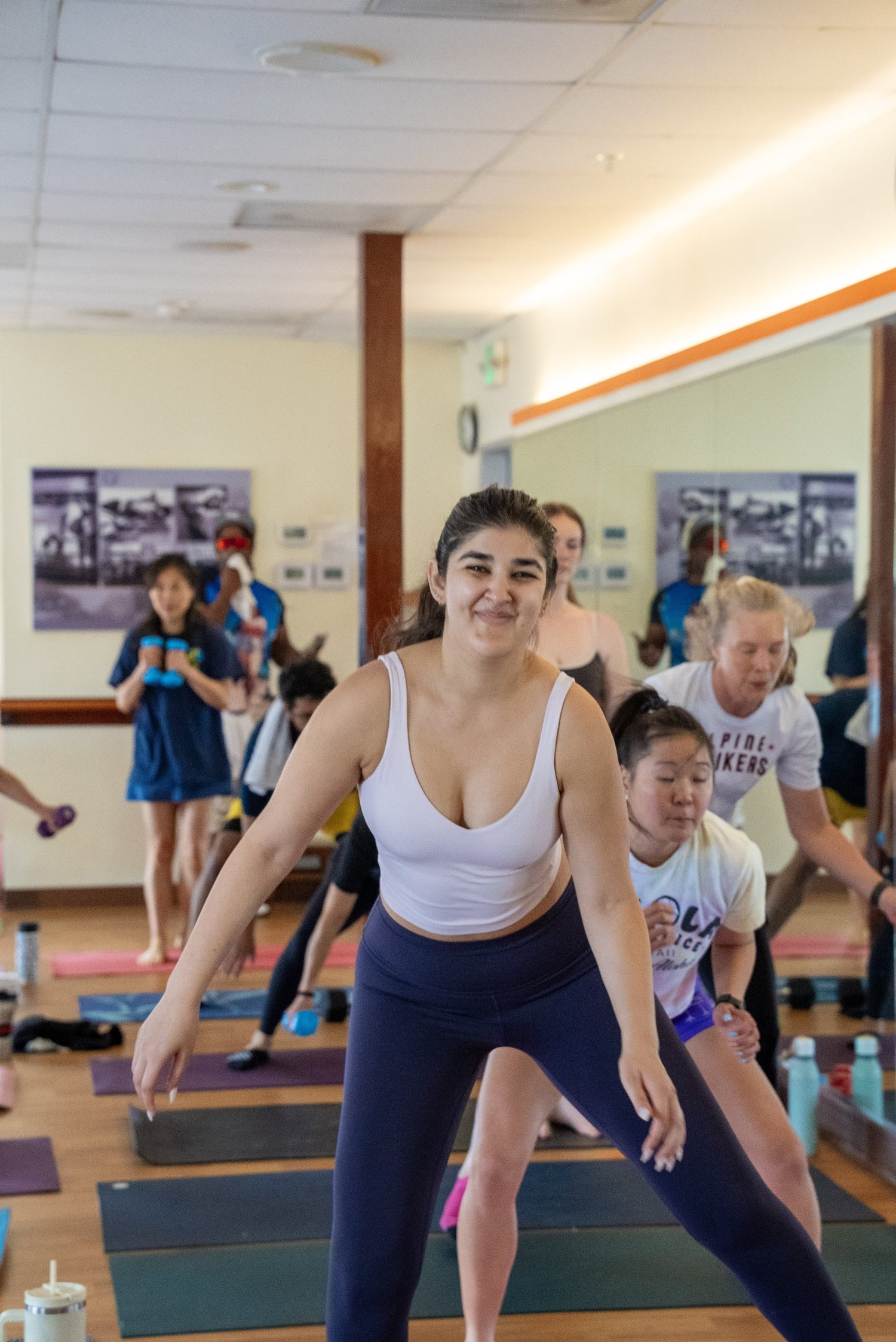 Smiling student in a Yoga Health Center class