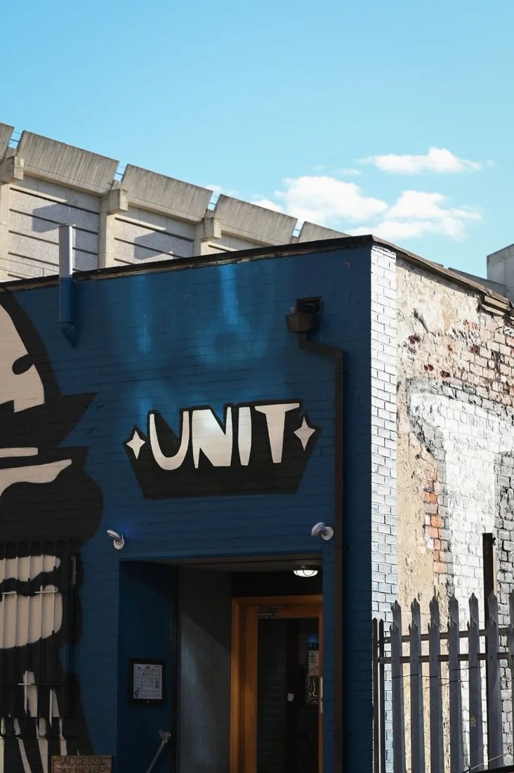 The blue Unit shopfront and sign on Headford Street, Sheffield