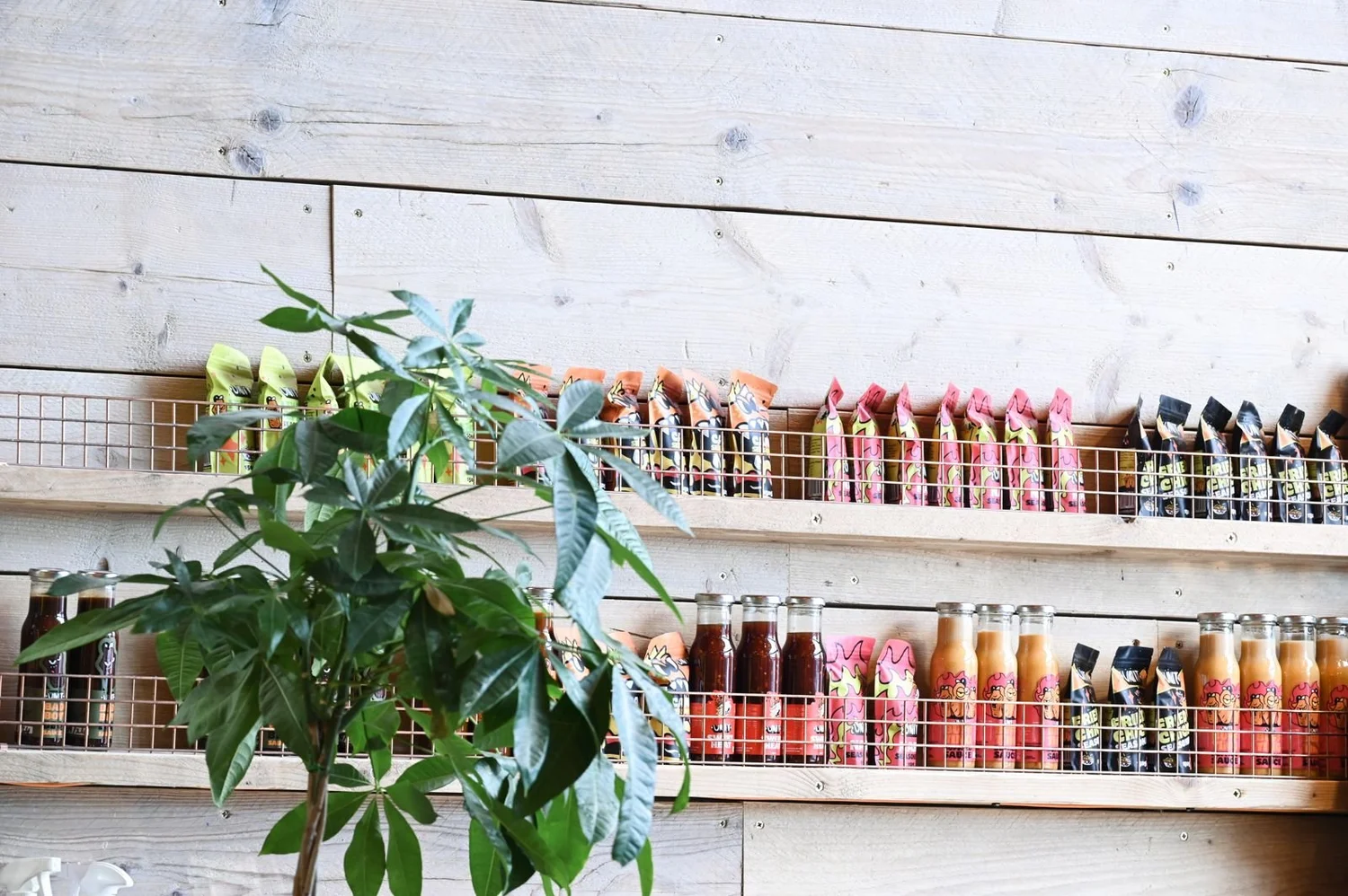 Shelves of Unit house sauces and seasonings in the diner