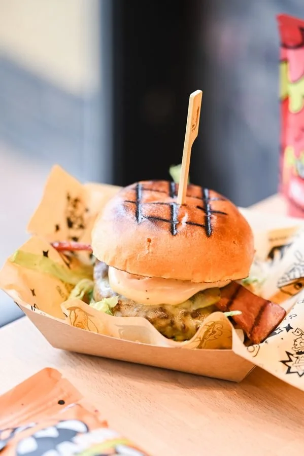 A Unit beef burger with melted cheese, beef bacon and house sauce