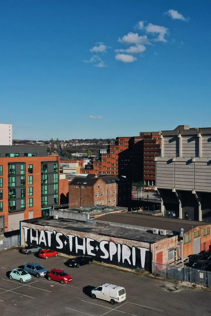 Aerial view of Sheffield city centre and the That's the Spirit mural by Unit on Headford Street