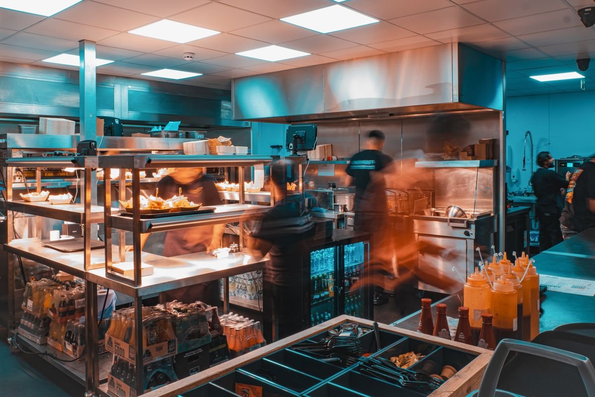 The Unit kitchen in full swing, with orders under the heat lamps