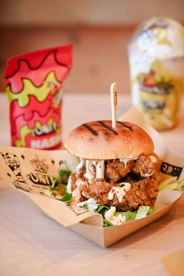 A crispy fried chicken burger with garlic mayo and chilli flakes