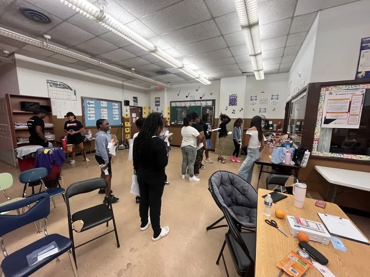 Students working through an activity in the classroom