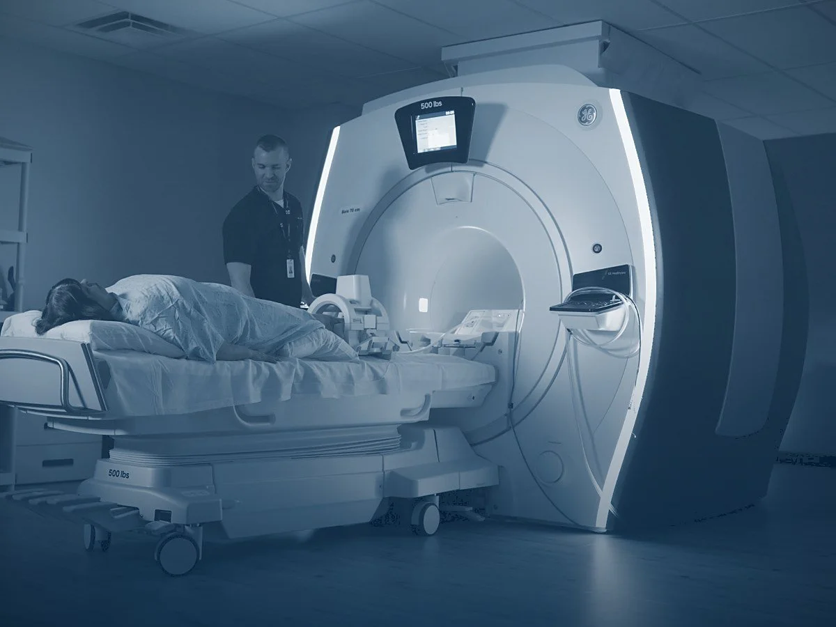 The MRI suite at MISH Hospital in Lenexa, with a technologist positioning a patient.