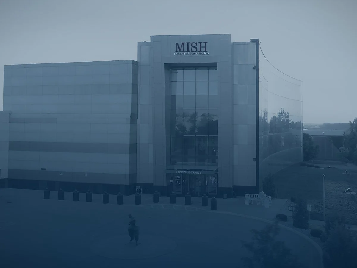 The MISH Hospital and Clinics building in Lenexa, Kansas, at sunrise, showing the main hospital entrance.