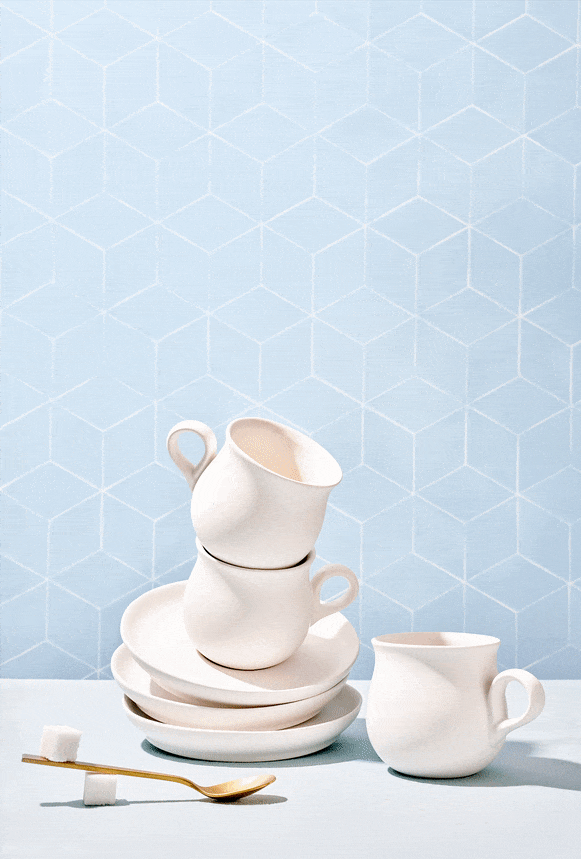 Animated GIF of a playful pour into a stack of teacups.