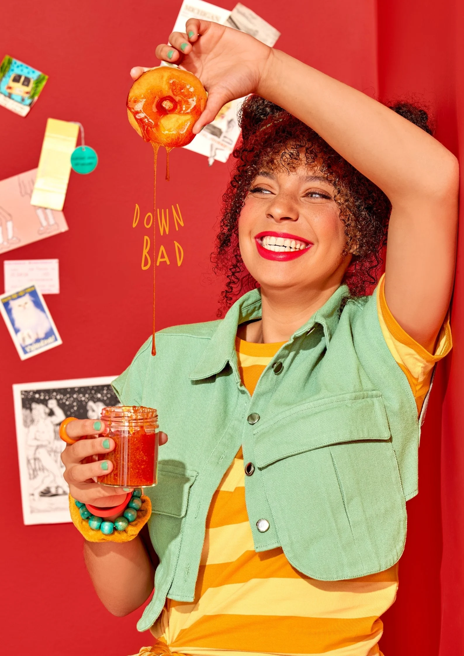 She's down bad. Woman holds a sticky, drippy, hot honeyed donut